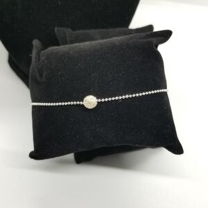Avon silver tone anklet with textured ball bead
